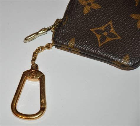 louis vuitton key purse.